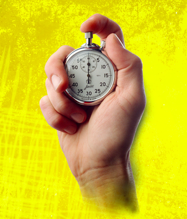 hand holding a stopwatch