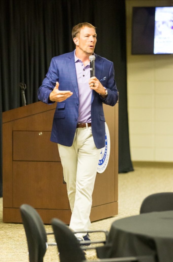 Dr Rob Bell speaking at a conference
